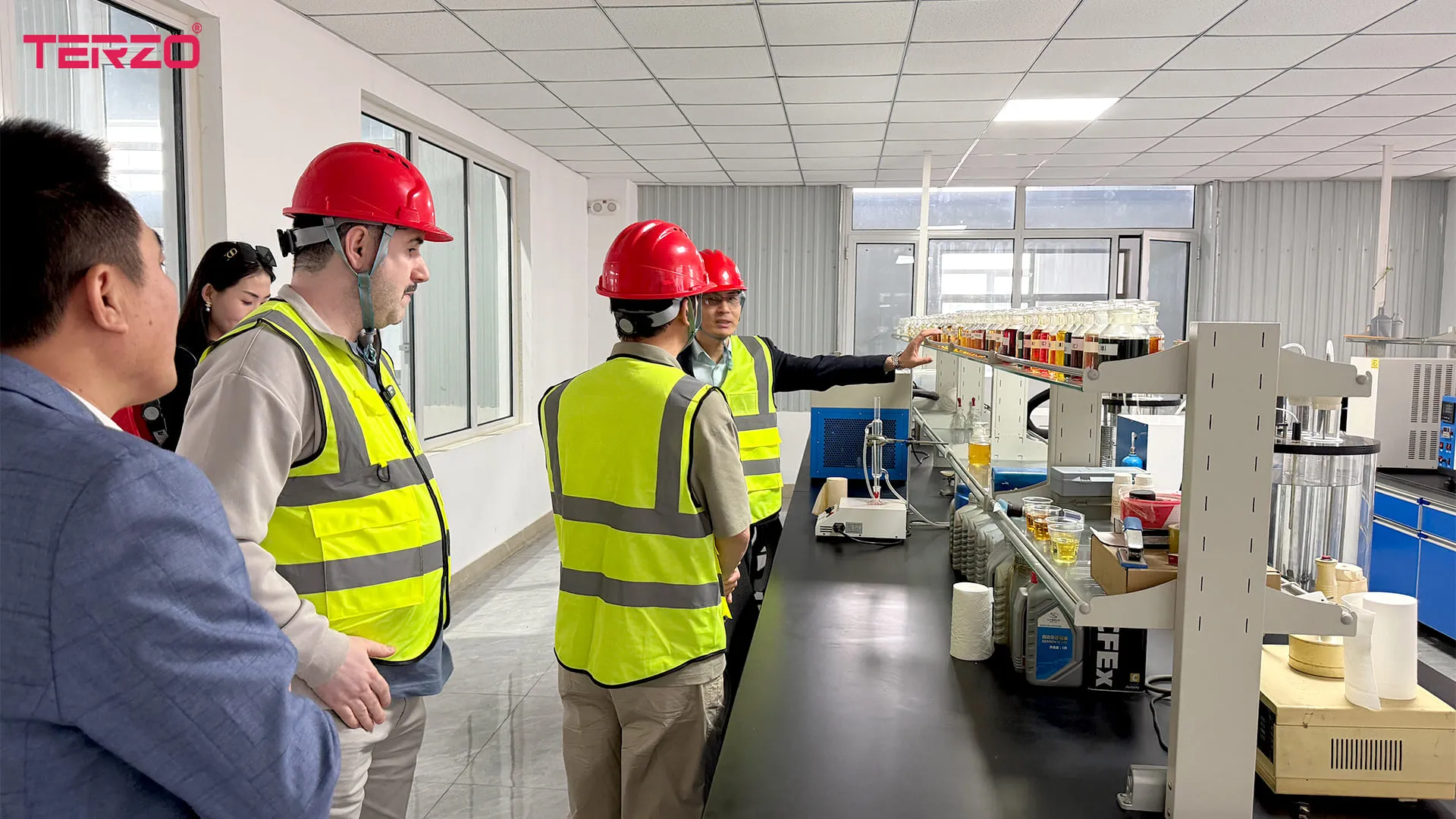 International buyer reviewing TERZO laboratory quality control to evaluate lubricant purchase cost and supply risk