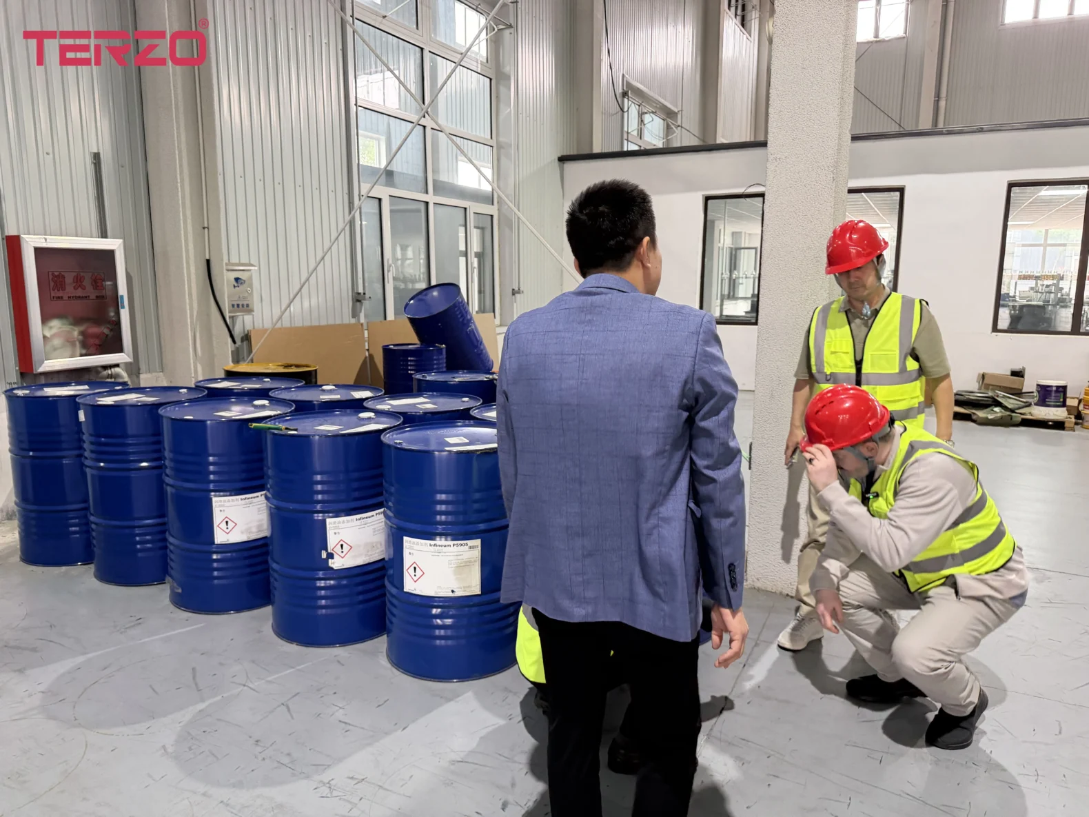Global partners visiting TERZO's base oil storage warehouse to understand how stable raw material reserves support lubricant margin_3_11zon